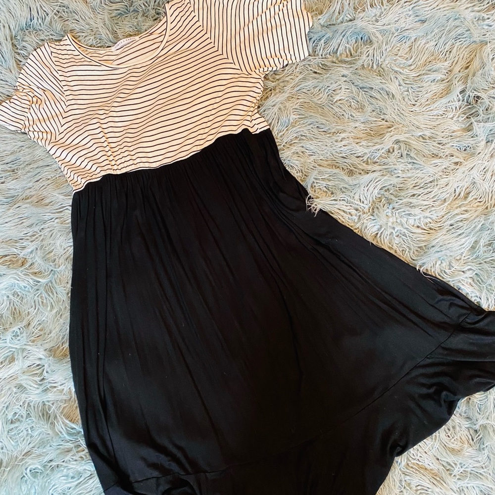 Black and white knee length dress with ruffle